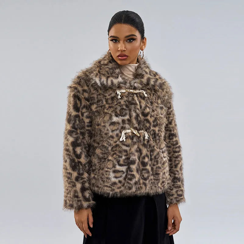 Women's leopard print street fashion coat with a buckle detail on the lapel.