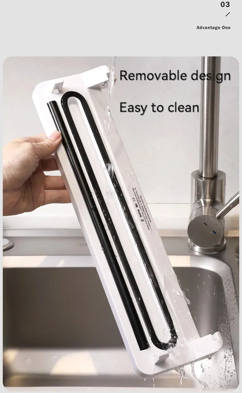 Black automatic vacuum sealer machine for household food preservation and item storage