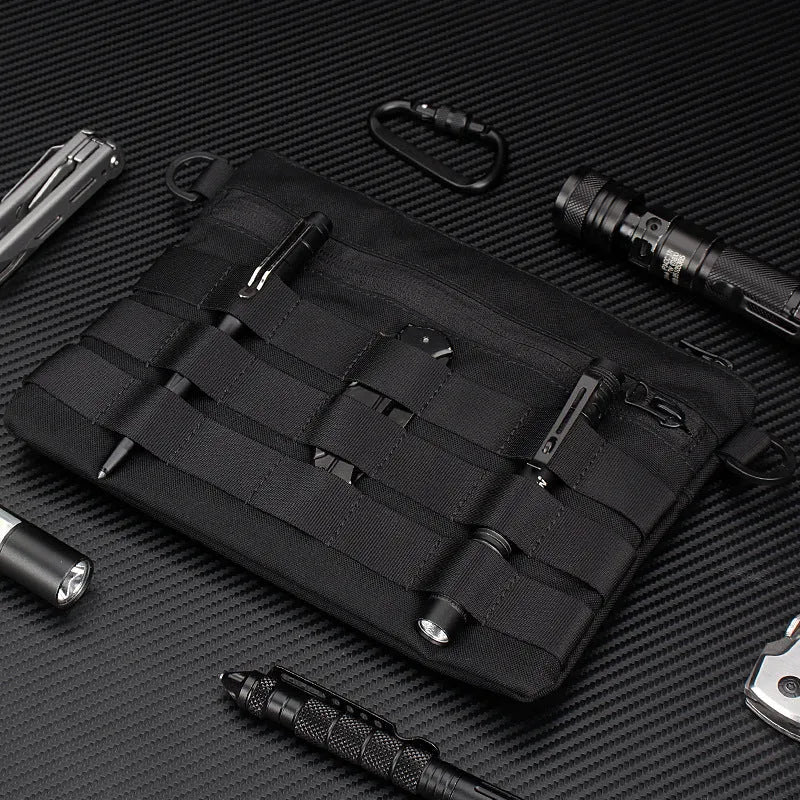 Solid black Oxford cloth portable organiser bag measuring 18cm by 3.5cm.