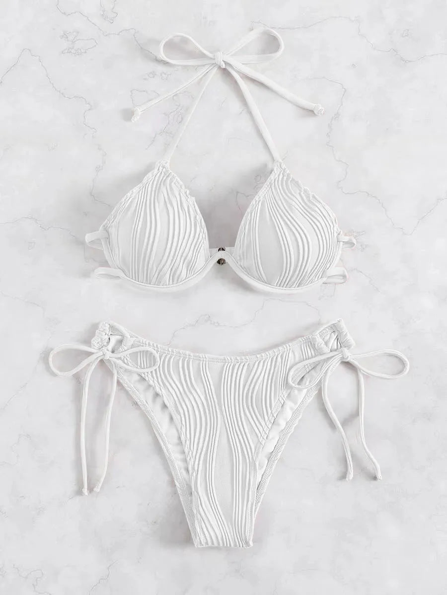 Women's apricot coloured bikini swimsuit with internal steel bracket support.