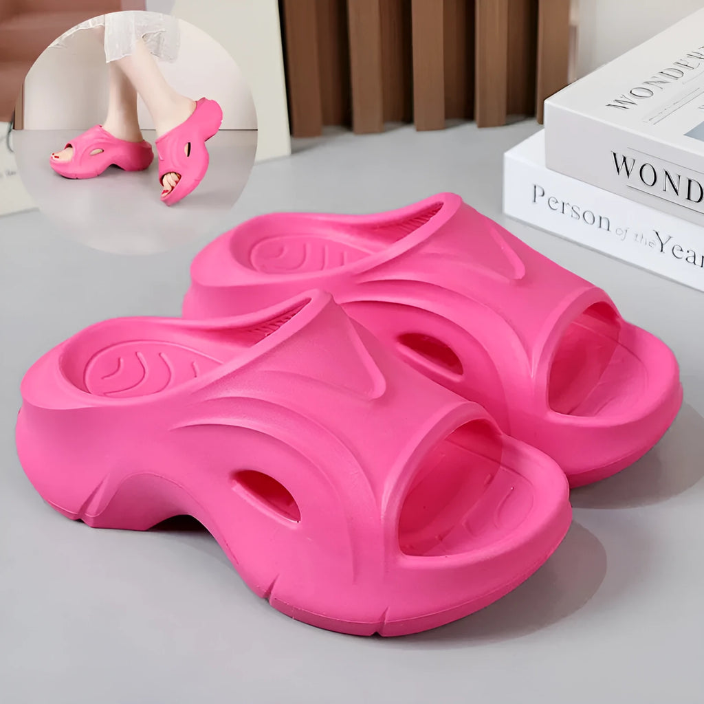 Women's white EVA slippers with thick sole and round toe on sandy beach