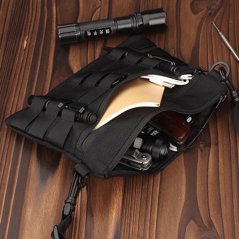 Solid black Oxford cloth portable organiser bag measuring 18cm by 3.5cm.
