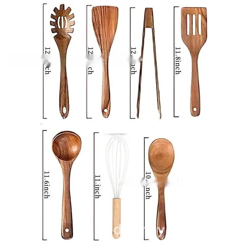 A set of seven wooden kitchen utensils including various spoons and spatulas on a table.