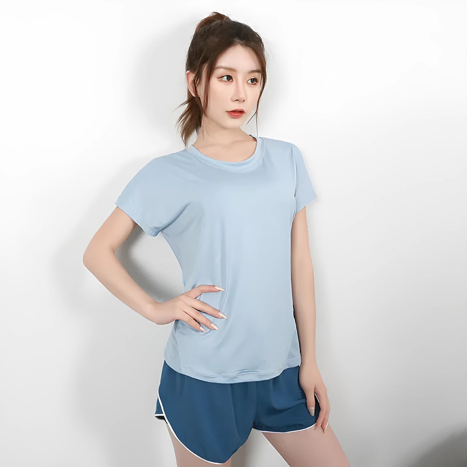 Women's short sleeve sports t-shirt in polyester fabric available in four colours