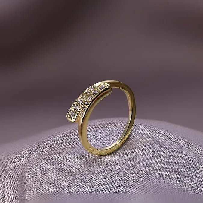 Geometric gold plated toe ring with rhinestone or water drop decoration on an alloy band.