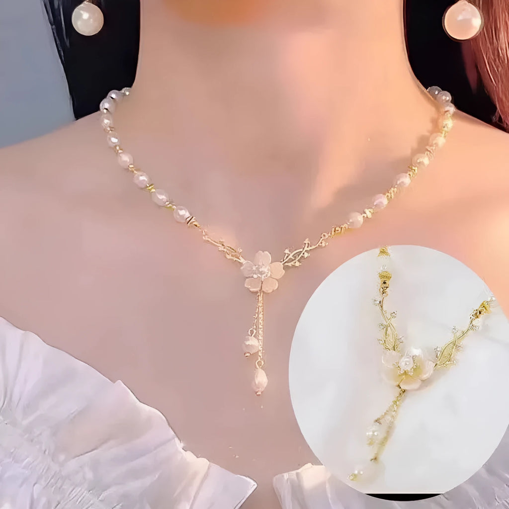 Alloy fashion necklace with pearl flower design and rose floral elements on pearl chain