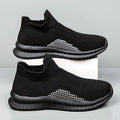 Men's popcorn flyknit low-top casual sneaker in solid colour on a viscose sole.