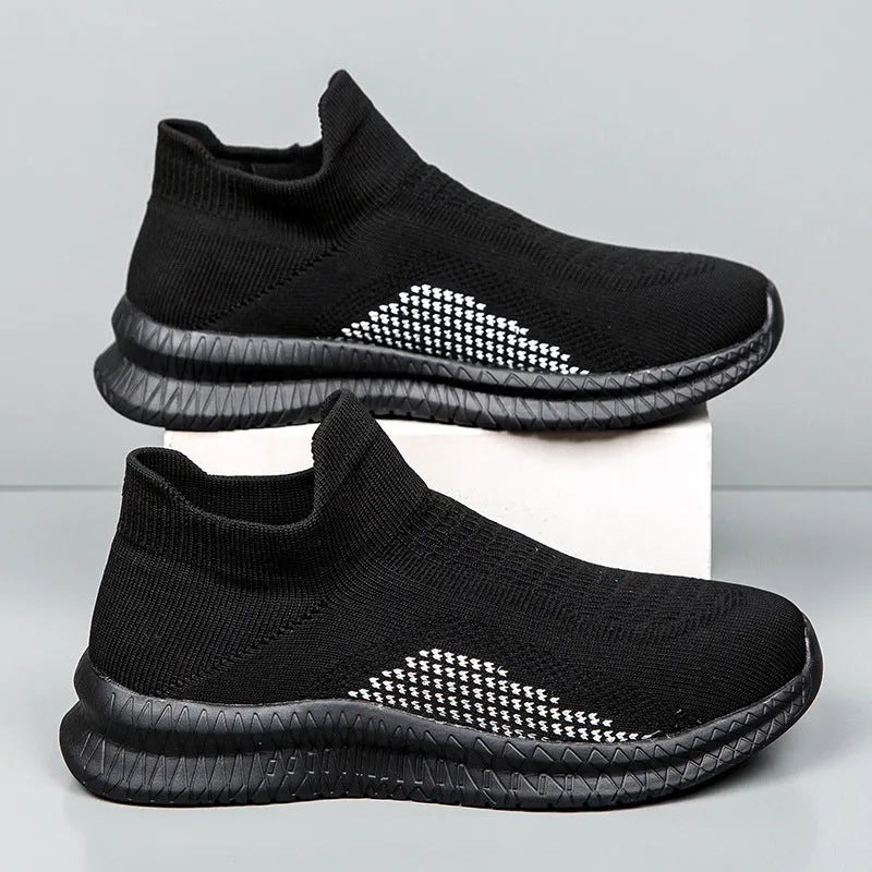 Men's popcorn flyknit low-top casual sneaker in solid colour on a viscose sole.