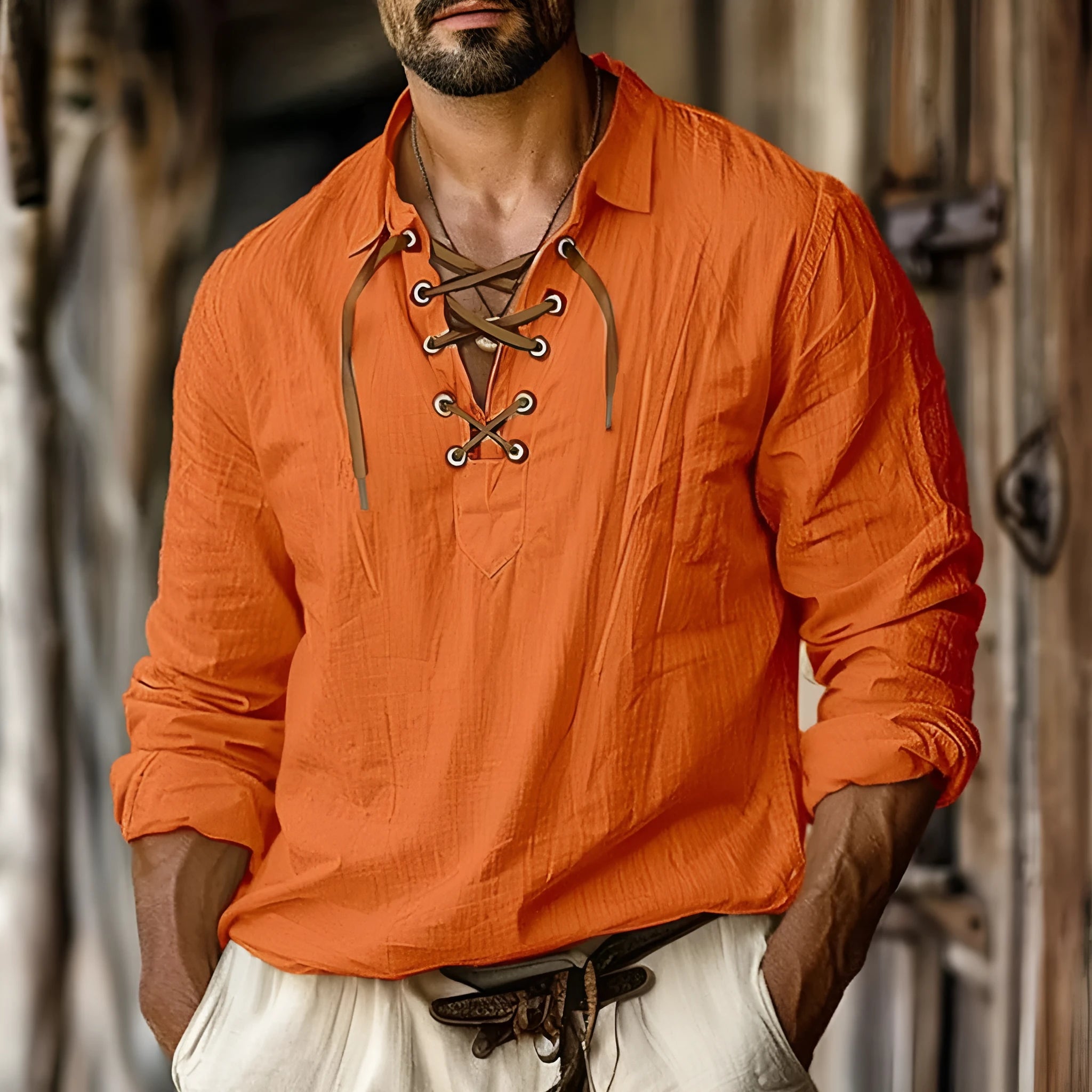 Men's loose fit blue linen blend shirt with lace-trimmed lapel collar and long sleeves.