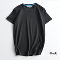 Men's solid colour combed cotton round neck T-shirt on a hanger