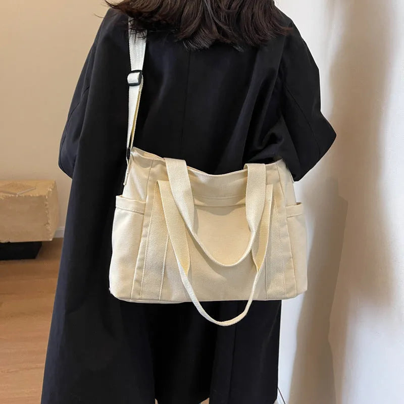 Women's large canvas shoulder tote bag with sandwich pockets and phone compartment in solid colour