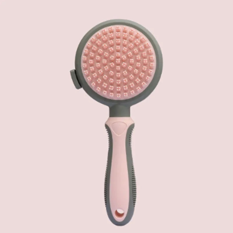 Green two-sided silicone pet brush with retractable slicker pins and a silicone massager head.