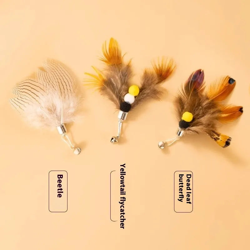 Three steel wire cat toy replacement heads with small flying insect designs and scratch-resistant coating