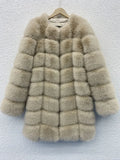 Women's thick warm artificial fur coat in apricot colour with regular sleeves and 80cm length