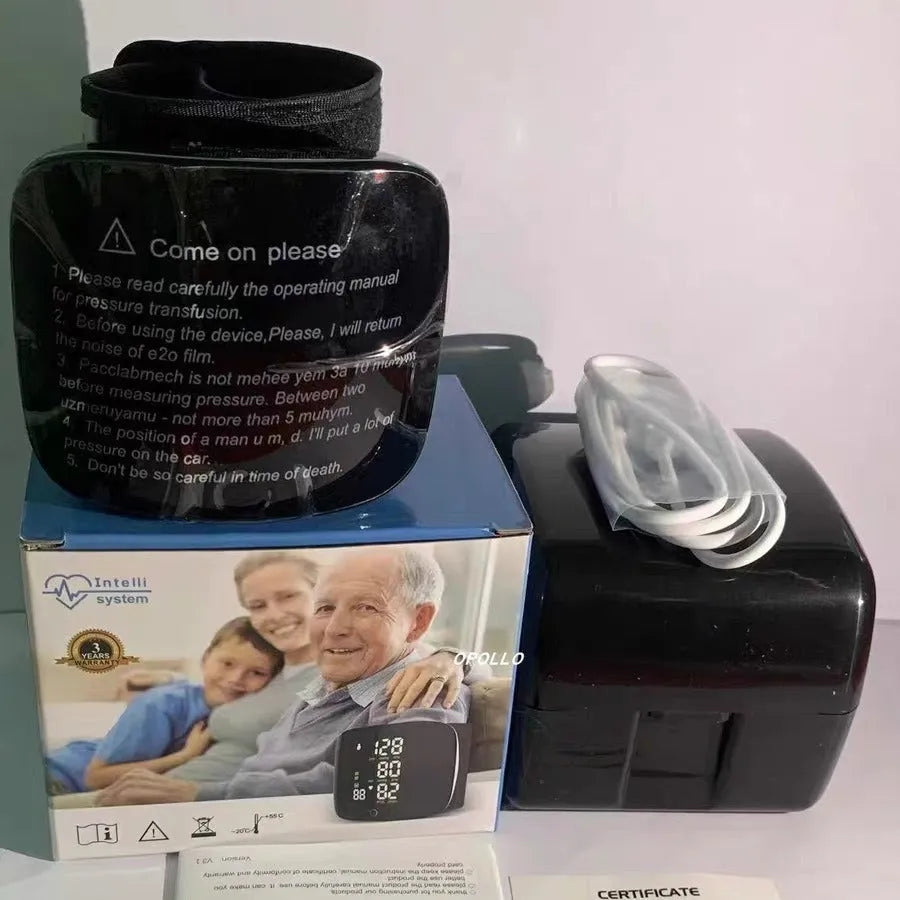 Black digital wrist blood pressure monitor with display and cuff for home health tracking