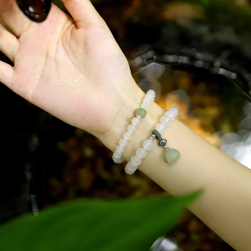 Women's bracelet with S925 silver and white agate Hetian jade beads in geometric lotus pattern