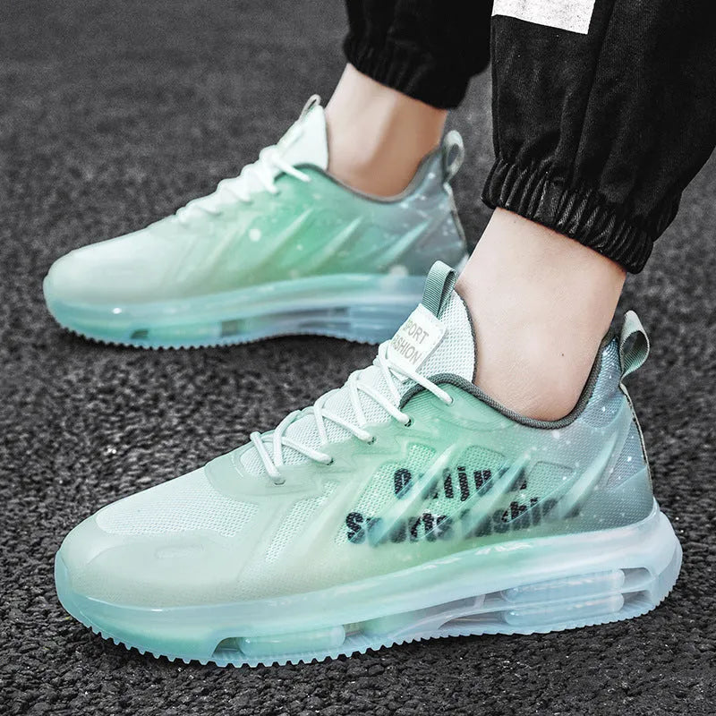 Men's black and green heightened platform casual shoes with mesh upper and rubber sole.
