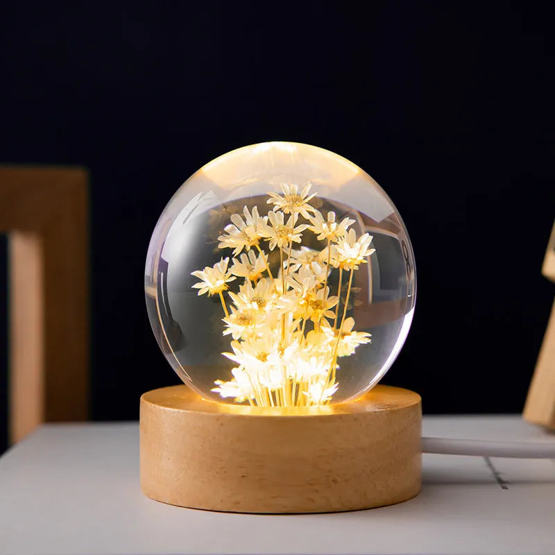 Preserved dandelion inside a glowing 60mm crystal ball on a beech wood stand, USB desktop night light.