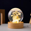 Preserved dandelion inside a glowing 60mm crystal ball on a beech wood stand, USB desktop night light.