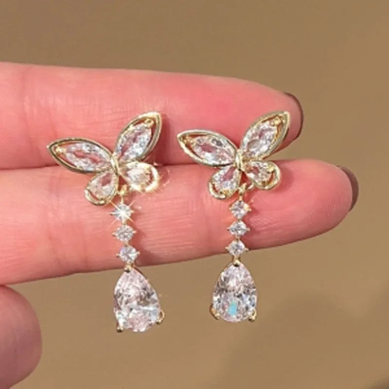 Platinum bow-shaped stud earrings with zinc alloy electroplated construction