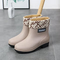 Women's mid-calf rain boot in black PVC with a low heel, shown alongside apricot and brown colour options.