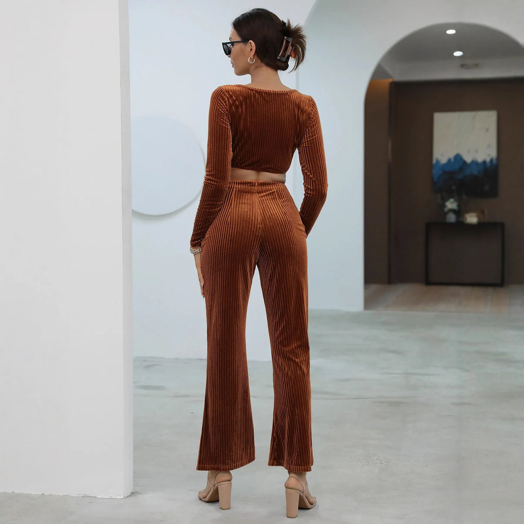 Caramel coloured long sleeve sweater and matching trousers casual set laid flat