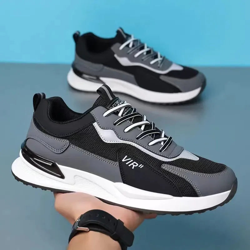Men's colour block mesh sneakers in grey with lace-up front and low-top design.