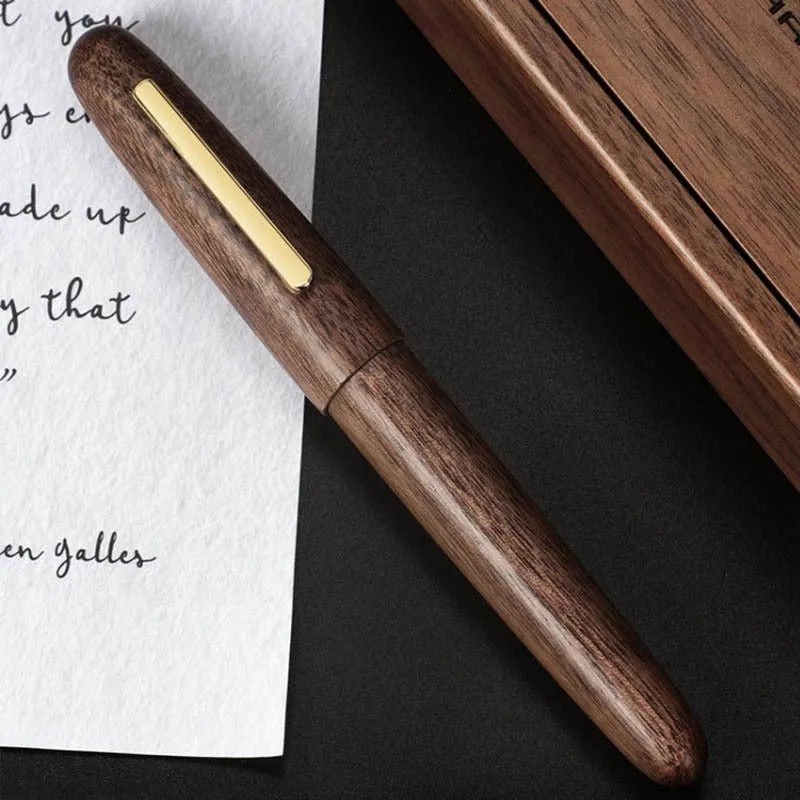 Wooden fountain pen with rotating cap showing seven wood colour options and four nib configurations