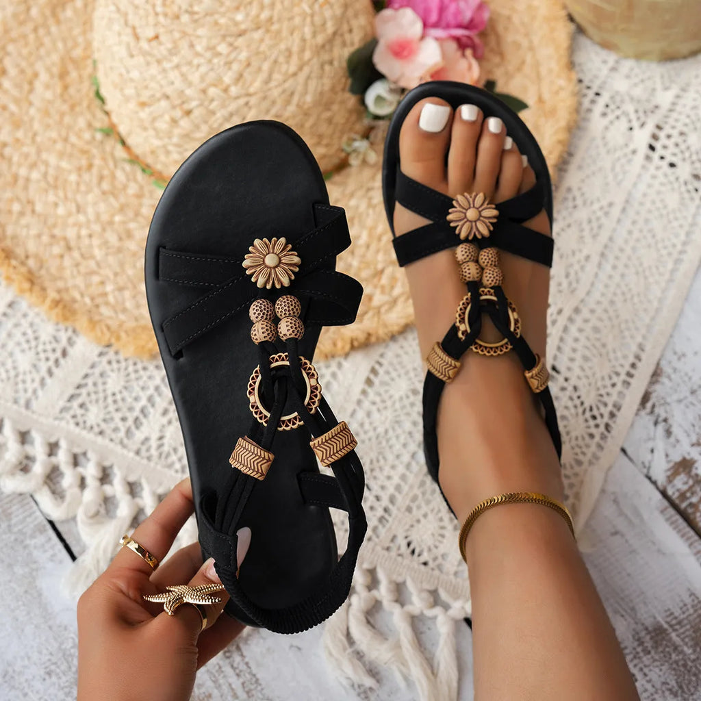 Black women's ethnic style flat sandals with woven open-toe design and beaded rhinestone decoration
