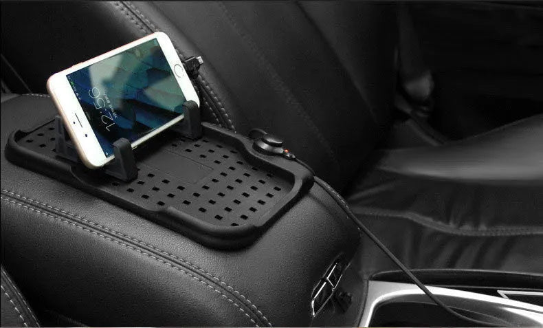 Black silicone car charging bracket mobile phone holder, 11x9.2cm, with magnetic charger and adjustable dashboard pad.