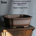 Purple sand rectangular bonsai flower pot on floor with drainage hole visible