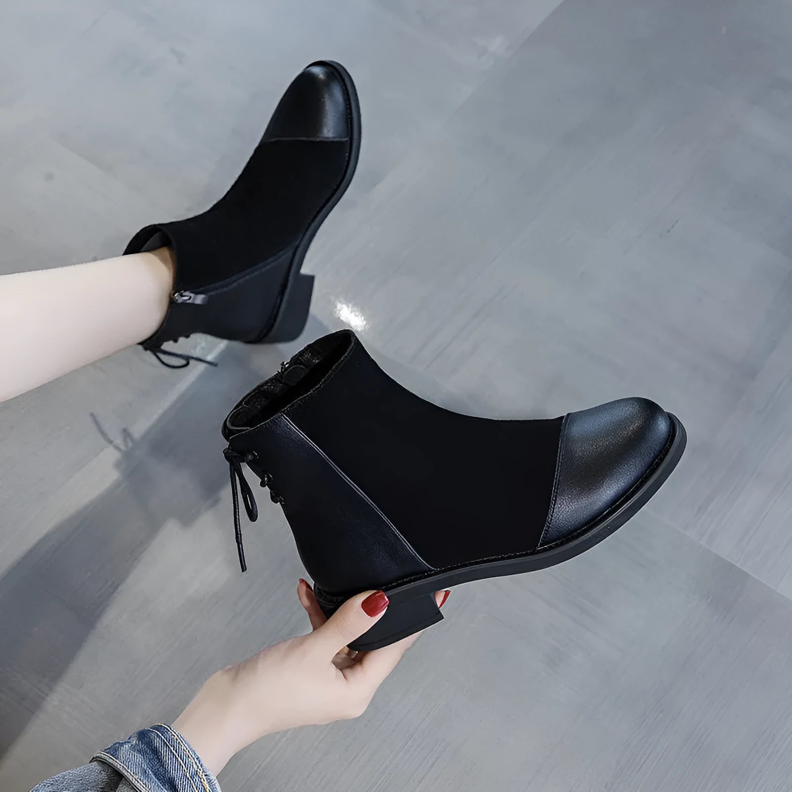 Black women's knee-length Martin boots with side zipper and round toe