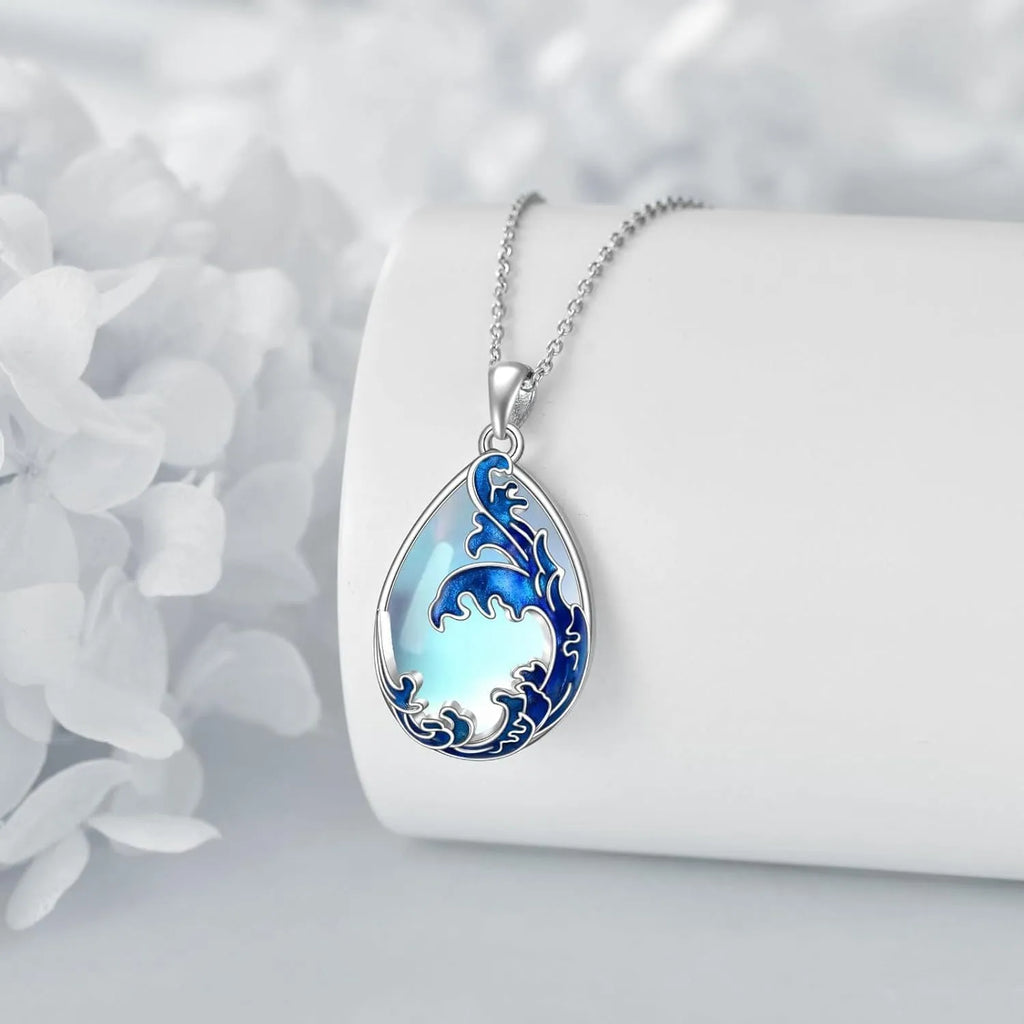 Moonstone blue heart pendant necklace with adjustable chain on display