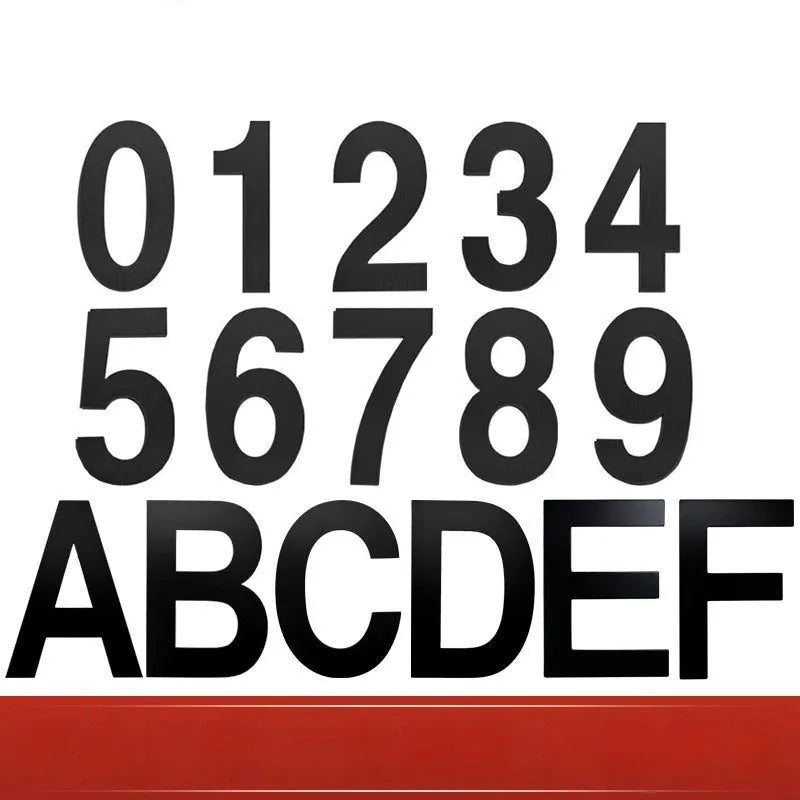 Black stainless steel adhesive house number sign showing the number 7, measuring 7.5cm.