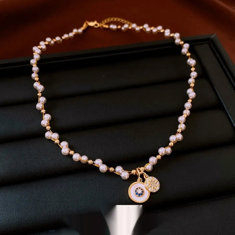 Real gold electroplated pendant necklace with round zircon-inlaid imitation pearl on adjustable clavicle chain