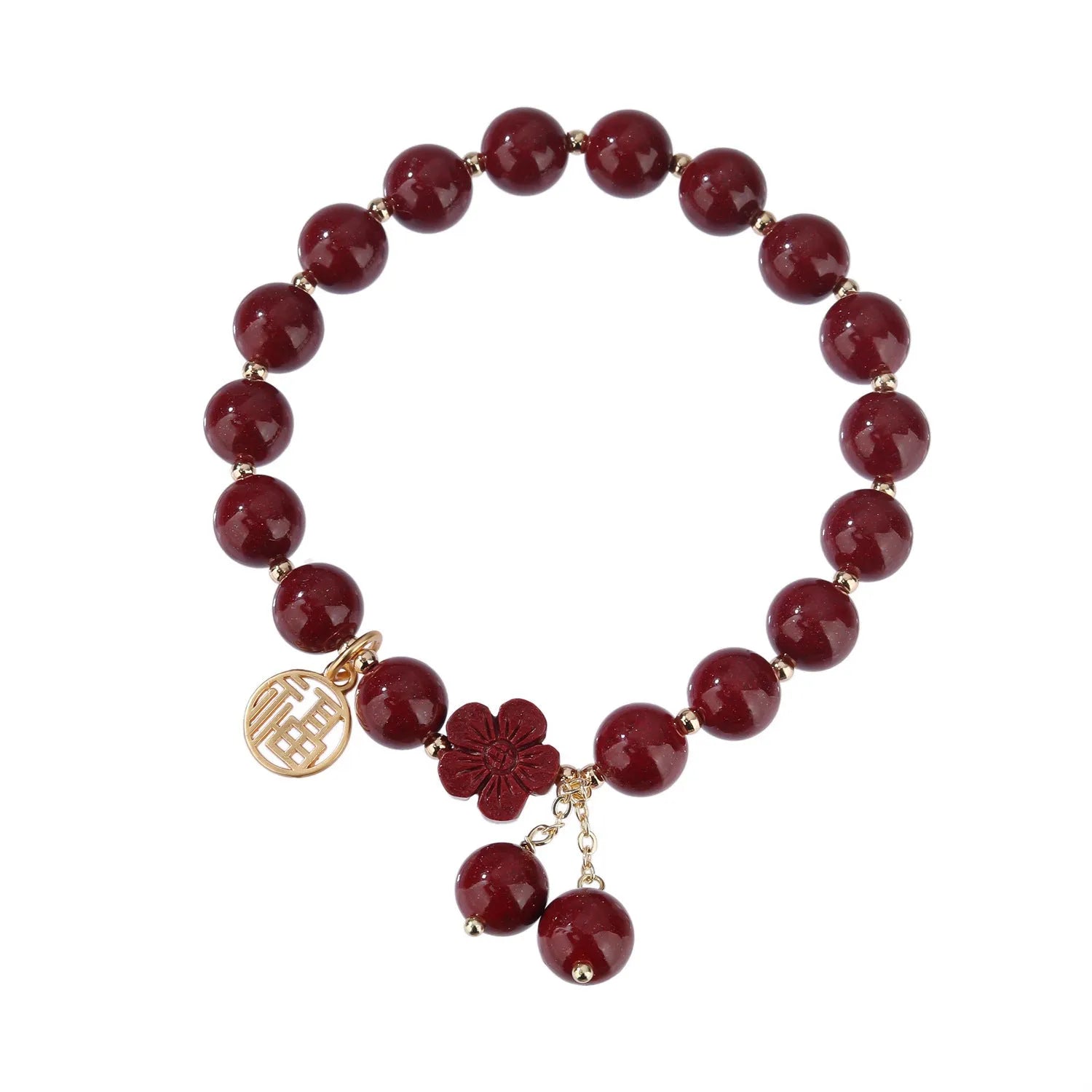 Close-up of a handmade purple gold sand cinnabar bracelet with a Fu character charm and peach blossom tassel.