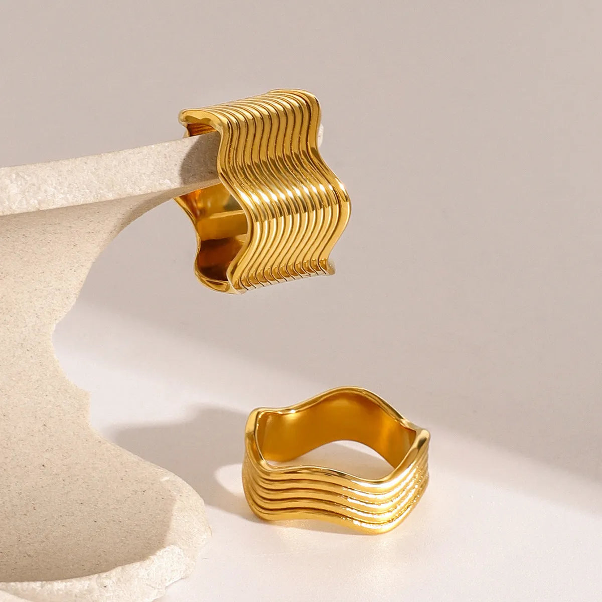 Stainless steel geometric wave pattern ring with wide surface and electroplated finish