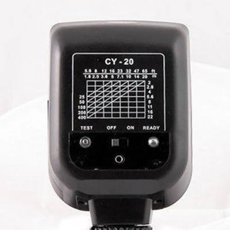 Compact silver hot shoe flash for SLR cameras with tilted head on a white background.