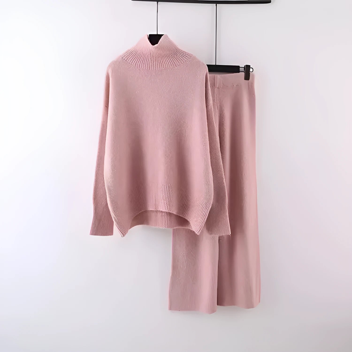 Women's casual acrylic fibre sweater and wide leg pants two-piece set in a solid colour.