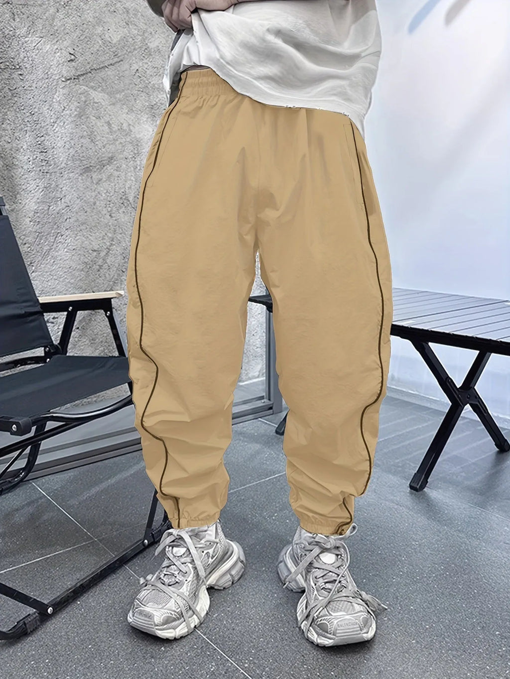 Men's loose fit bamboo fibre sports trousers in Army Green colour showing cropped length design