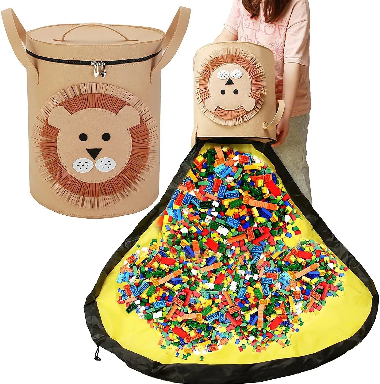 Green felt cube storage bag open showing toys inside, laying flat as play mat