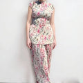 Long sleeve printed chiffon two-piece dress set with high-waist skirt on a model.