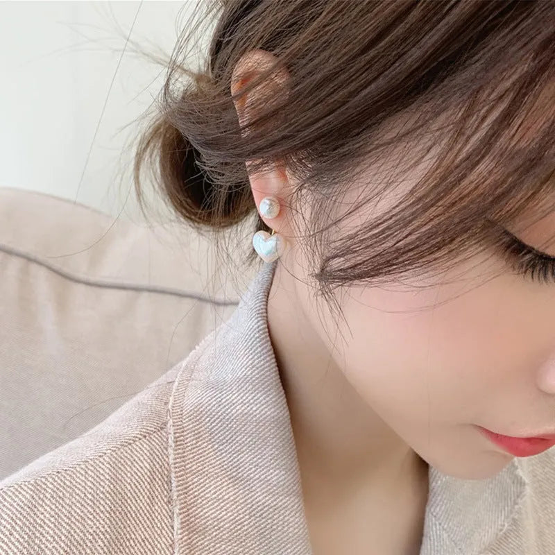 Heart-shaped stud earrings with artificial pearl gemstones in Korean style design