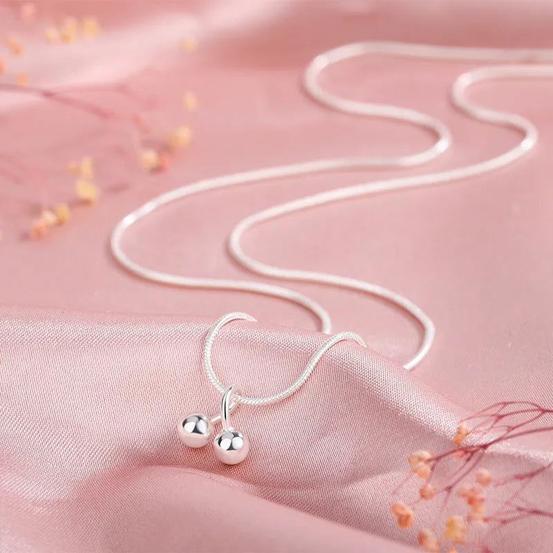 S925 sterling silver cherry necklace on adjustable snake bone chain for women.