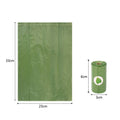 Roll of EPI degradable green dog poo bags next to a time-capsule-style dispenser on a grass background.