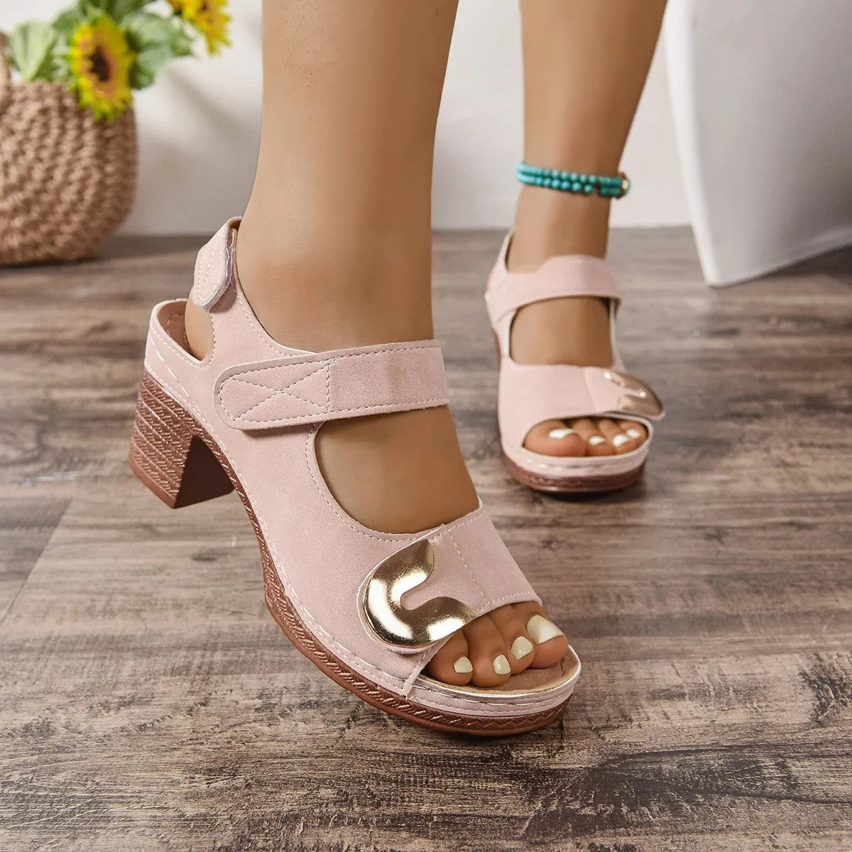 Light brown European-style sandals with a round toe and a single black Velcro strap closure.