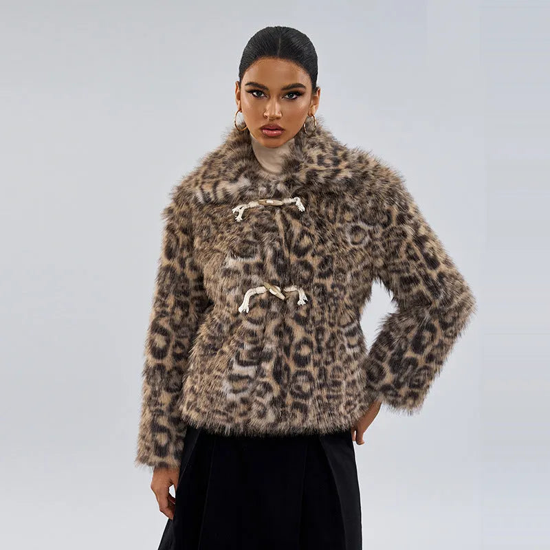 Women's leopard print street fashion coat with a buckle detail on the lapel.