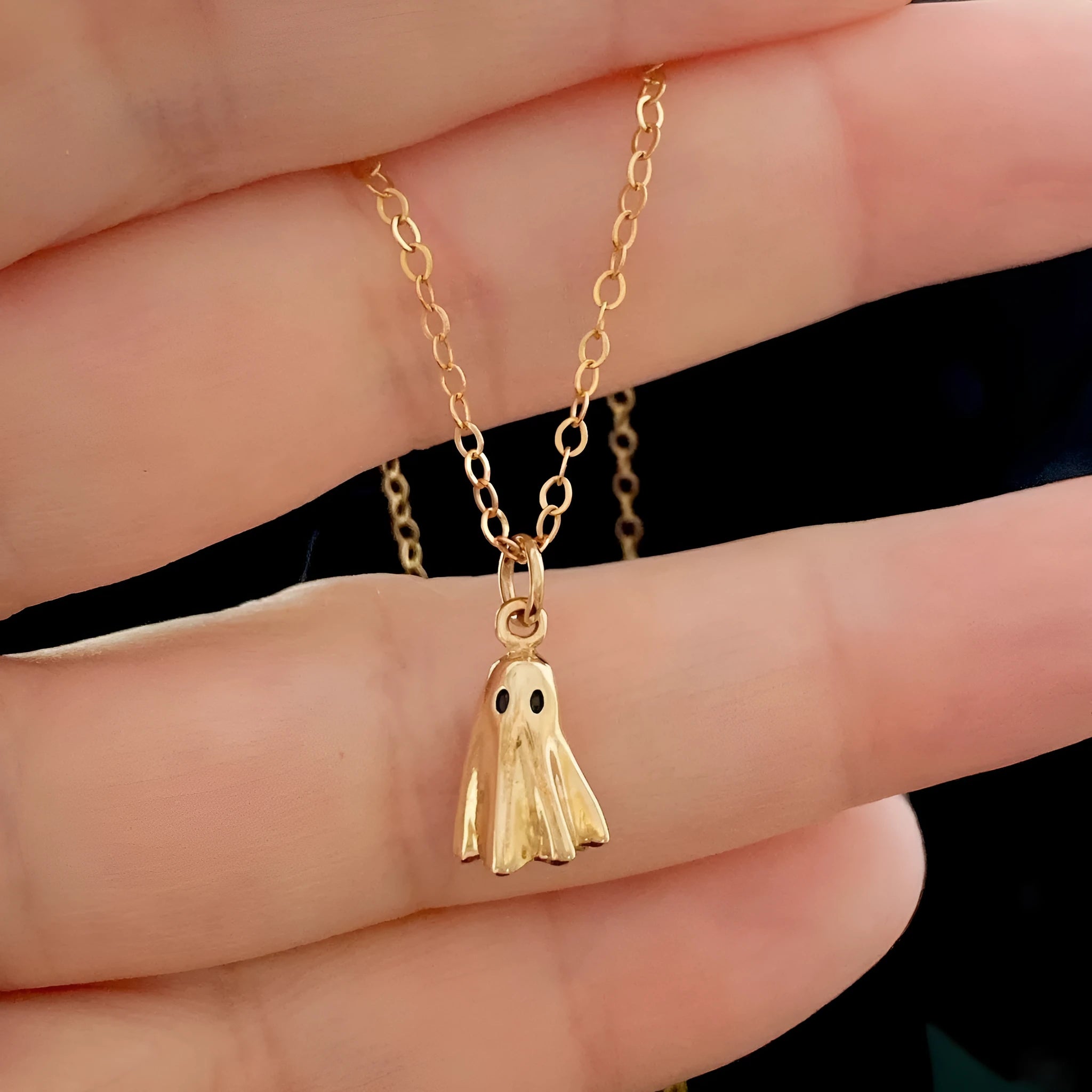 Ghost pendant necklace on a stainless steel chain with choice of cable, Figaro, or mini staple style.