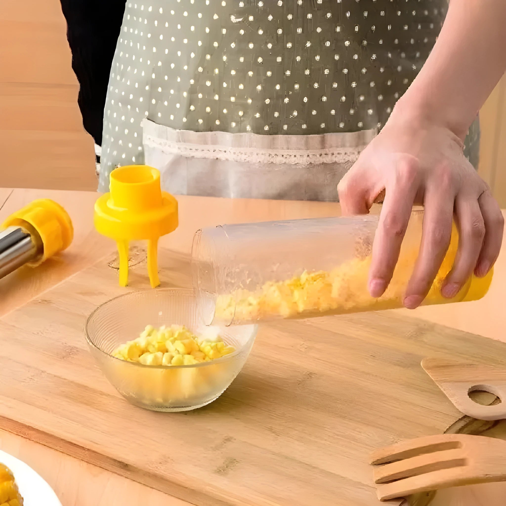 Yellow corn stripper tool with cylindrical design showing 27cm height measurement