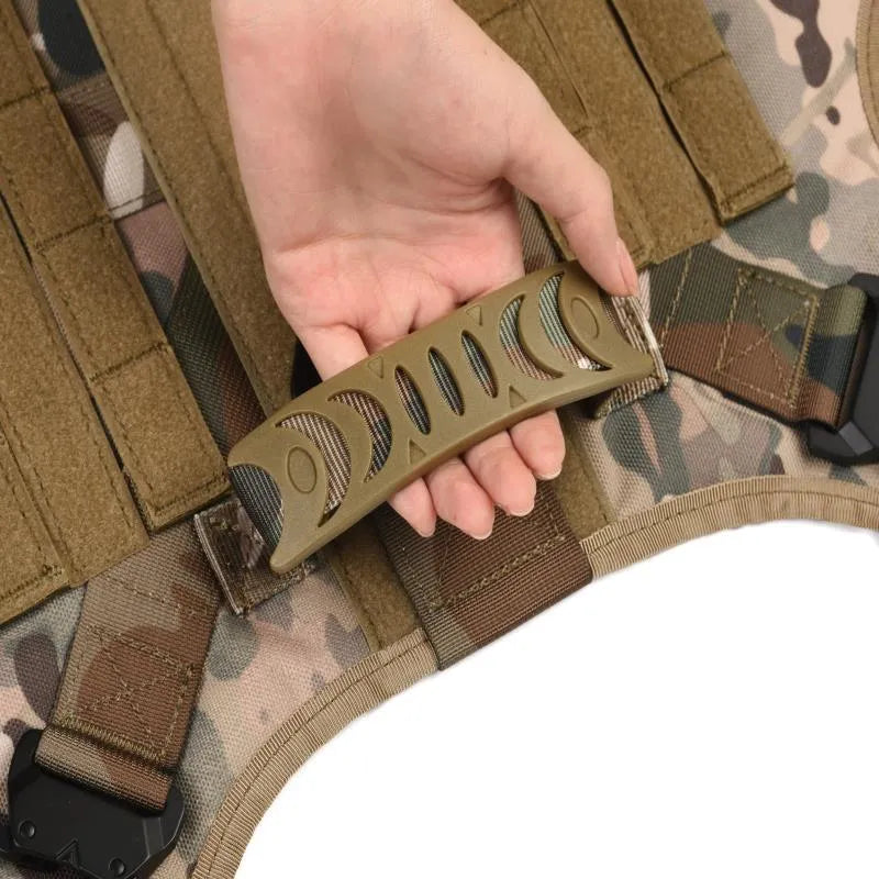 Dog wearing polyester combat training vest in camouflage pattern with lead attachments
